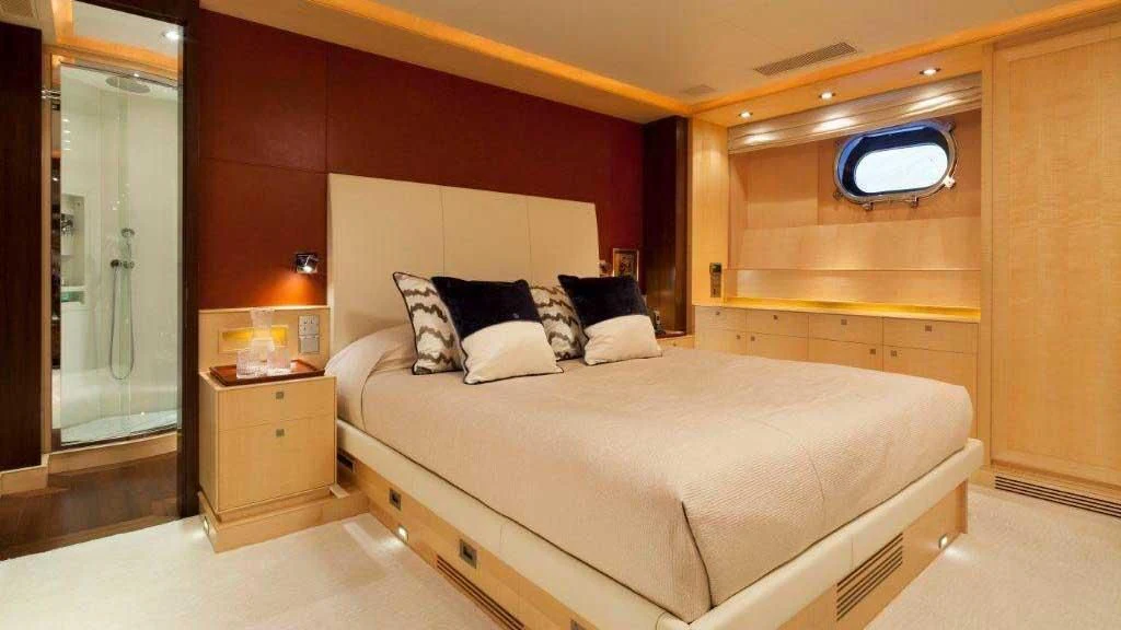 a bed in a room aboard VICTORIA A Yacht for Charter