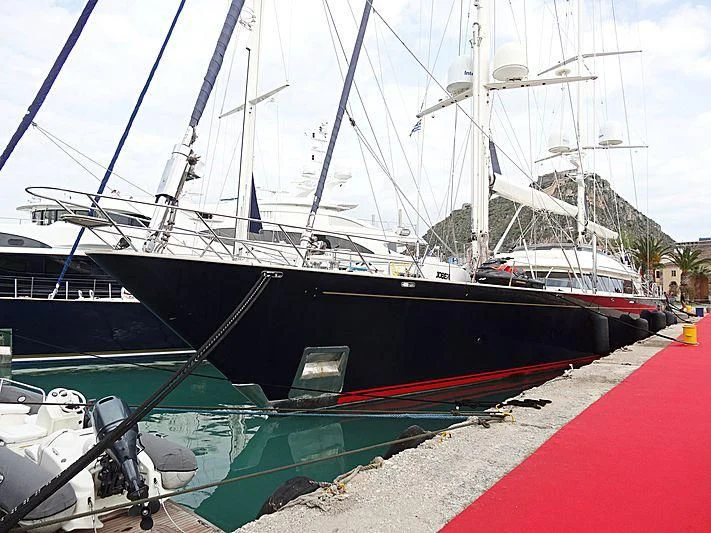 a boat docked at a pier aboard VICTORIA A Yacht for Charter