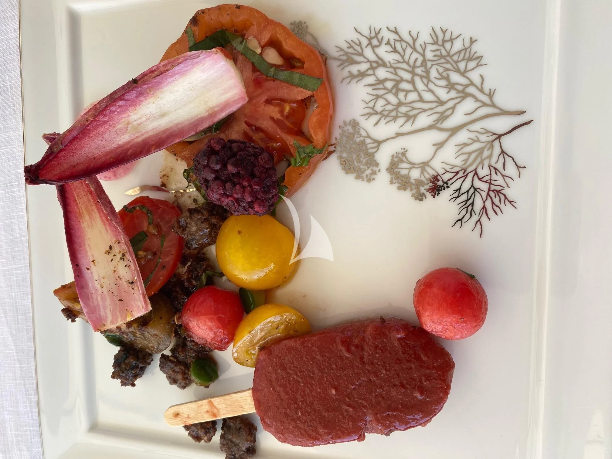 a plate of food aboard VICTORIA A Yacht for Charter