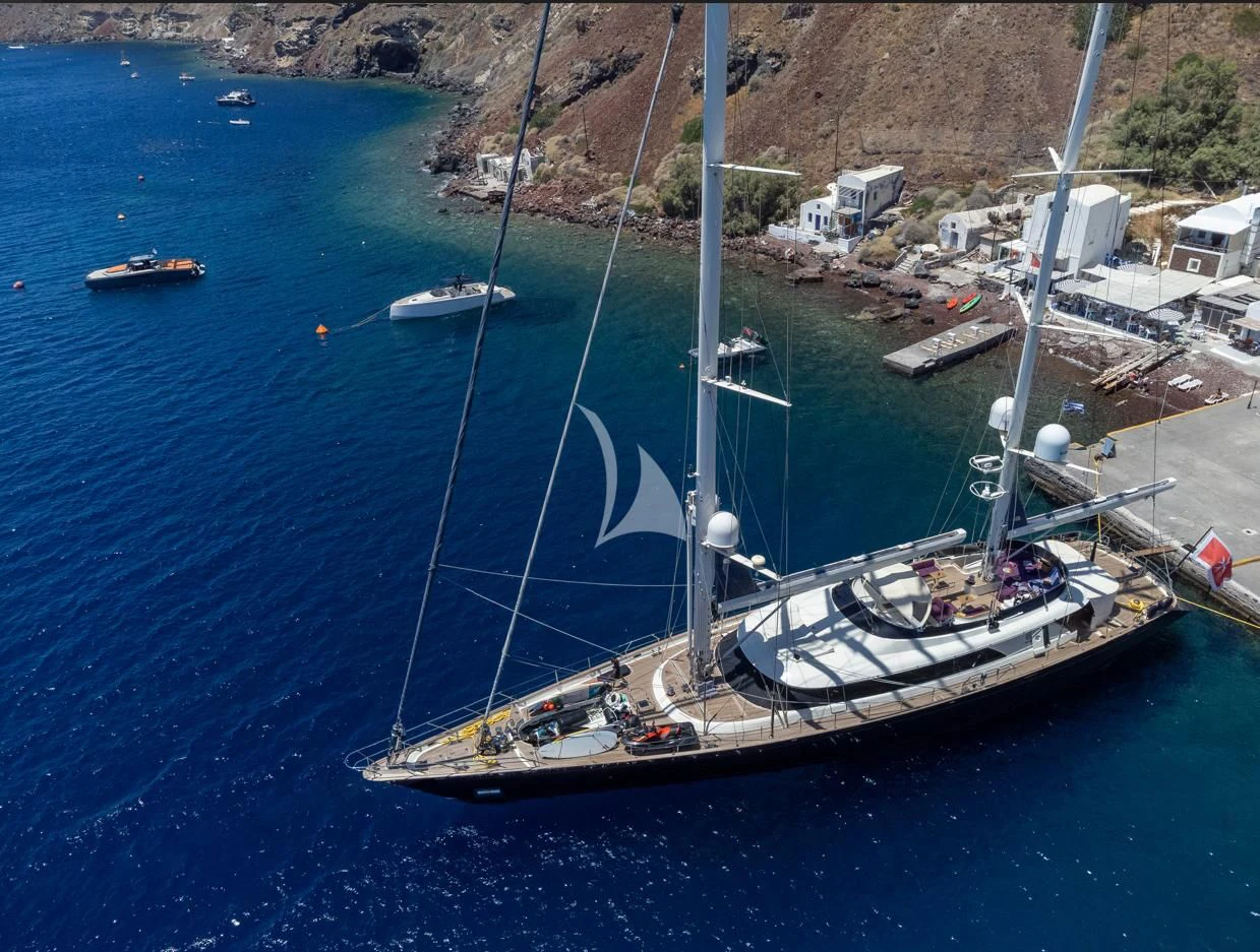 a boat docked at a pier aboard VICTORIA A Yacht for Charter