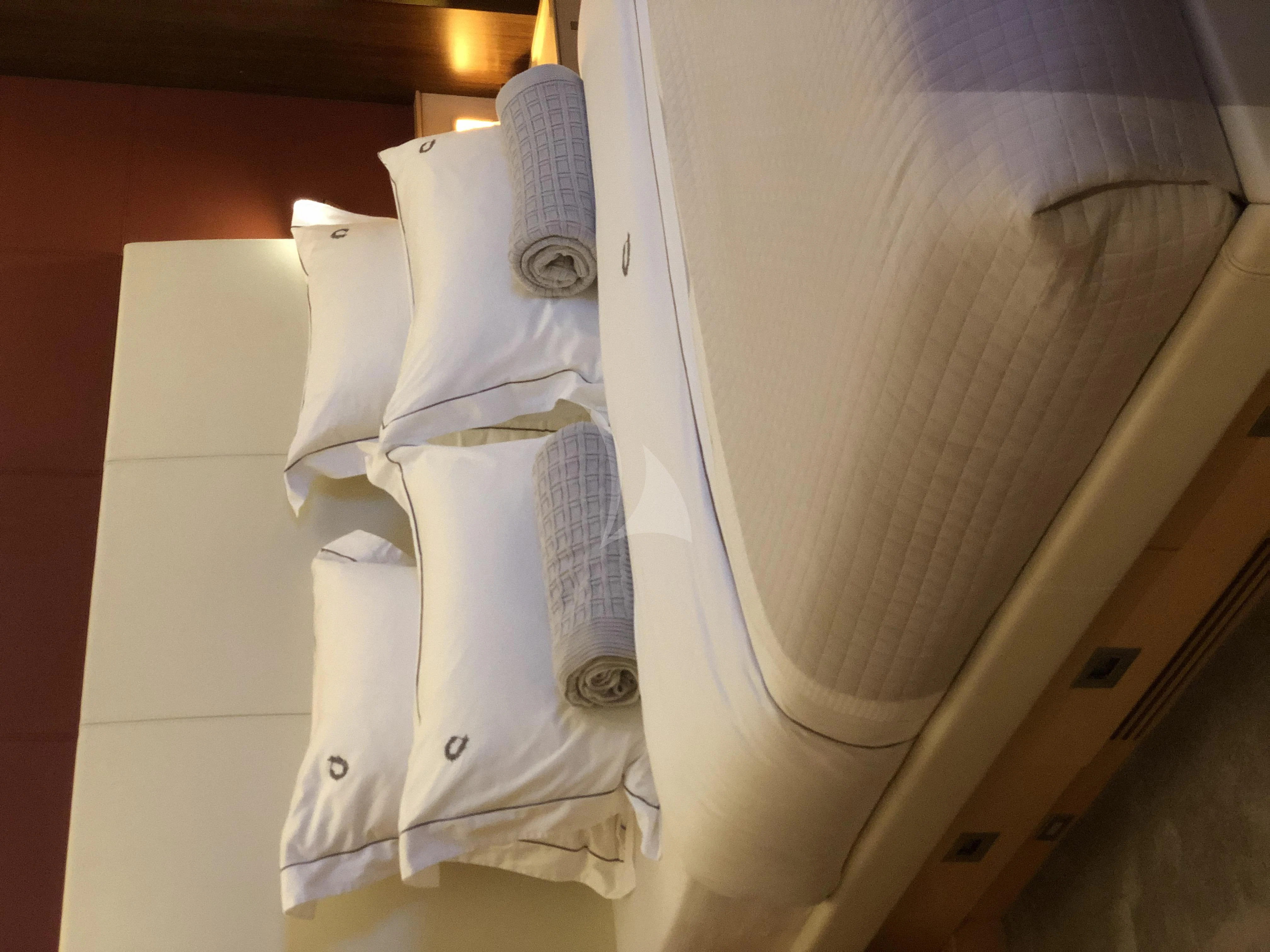 a row of towels on a rack aboard VICTORIA A Yacht for Charter