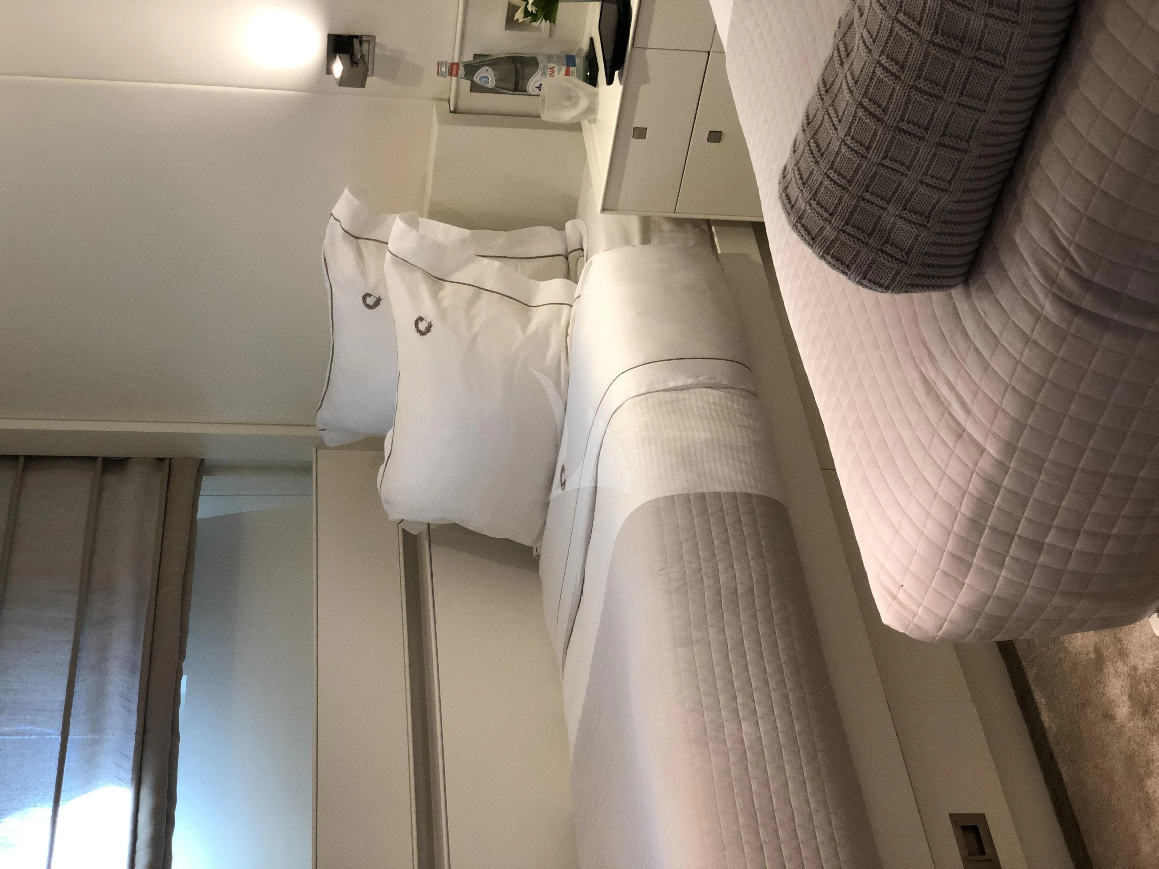 a row of white towels aboard VICTORIA A Yacht for Charter