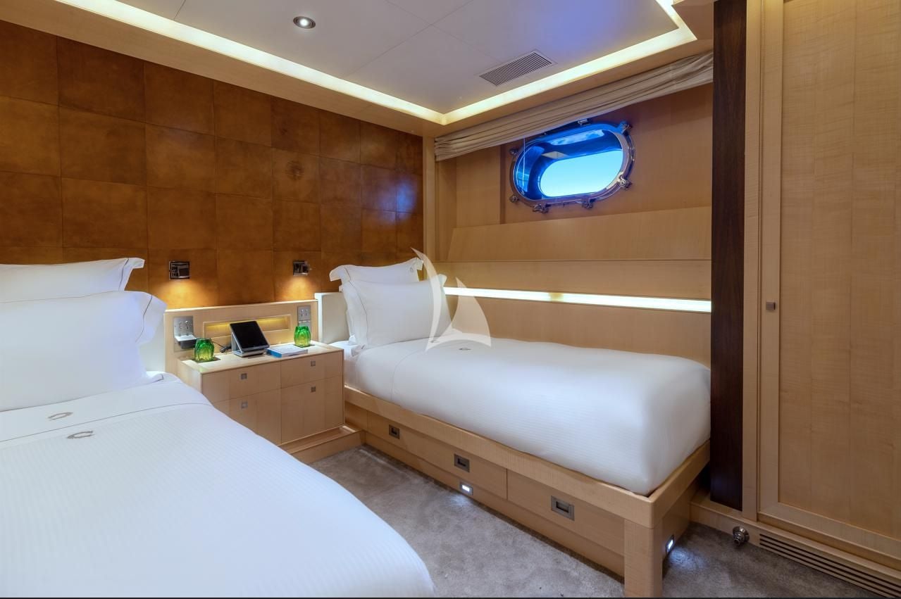 a room with two beds aboard VICTORIA A Yacht for Charter
