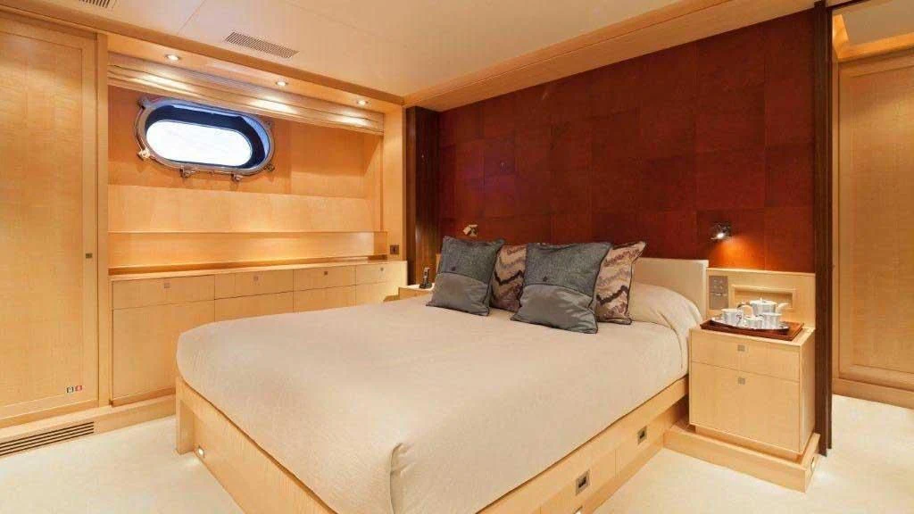 a bed in a room aboard VICTORIA A Yacht for Charter