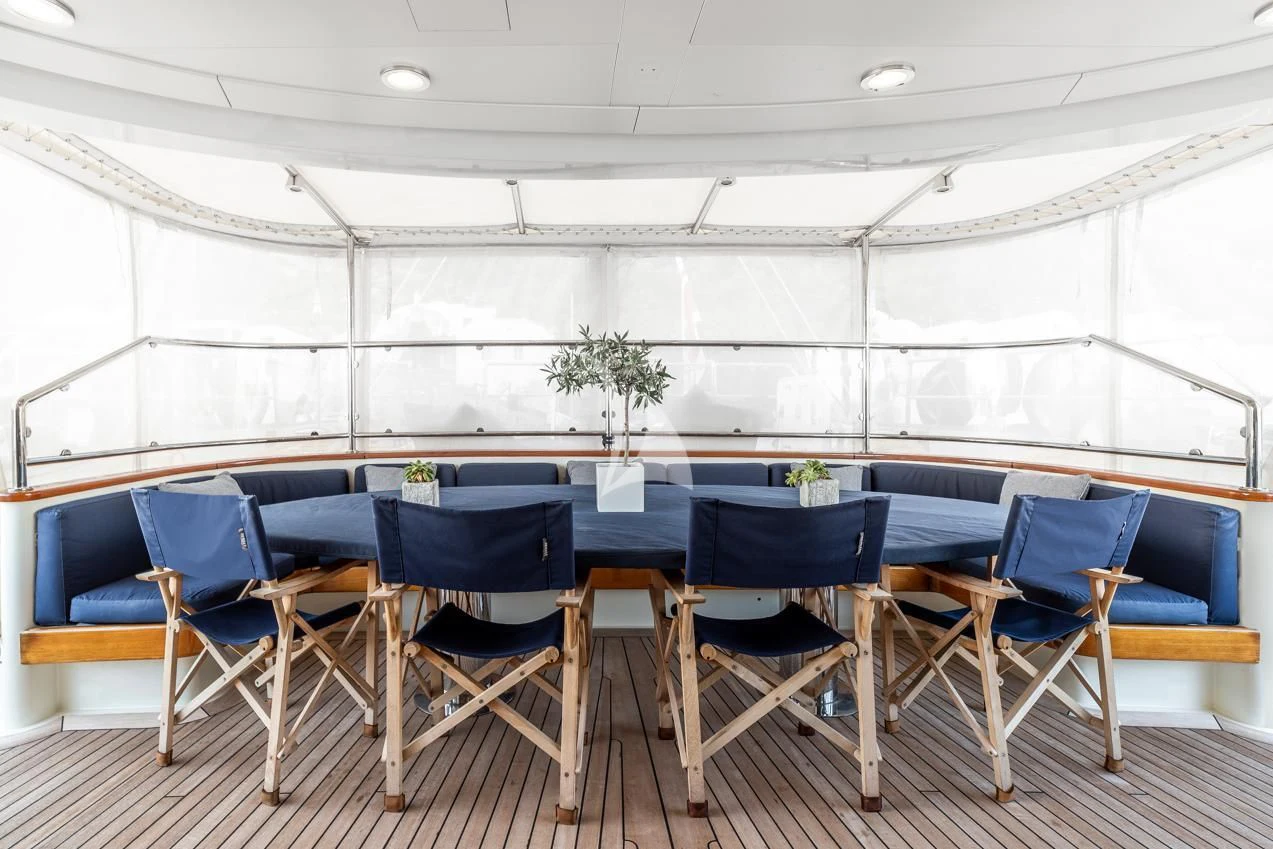 a pool table and chairs aboard VICTORIA A Yacht for Charter