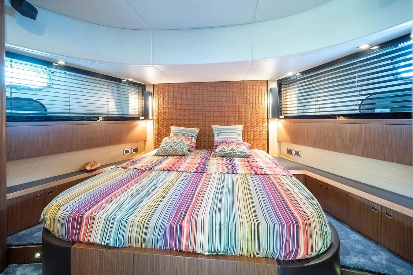 a bed in a room aboard CHARISMA II Yacht for Sale