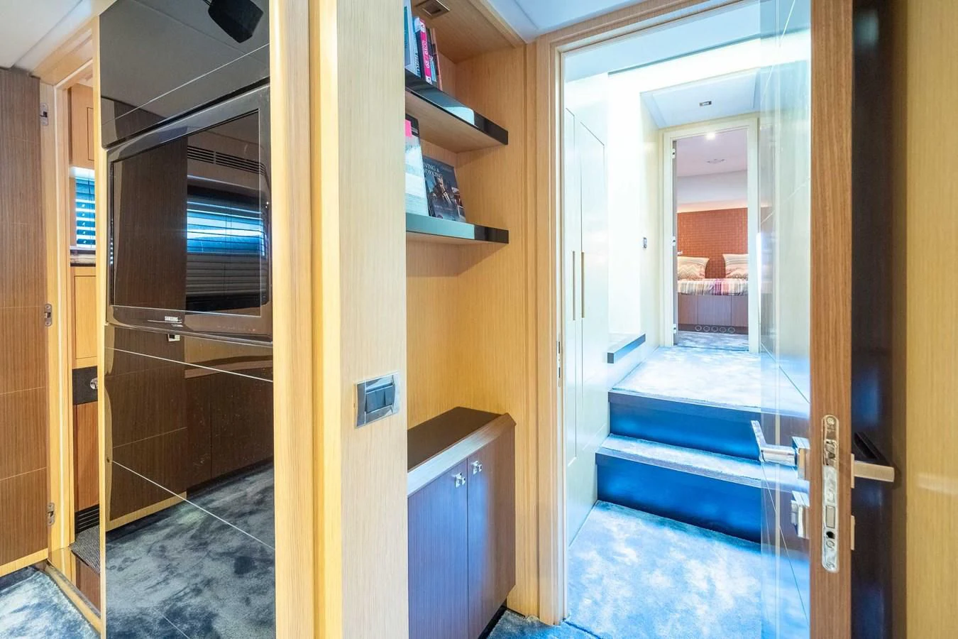 a room with a door open aboard CHARISMA II Yacht for Sale