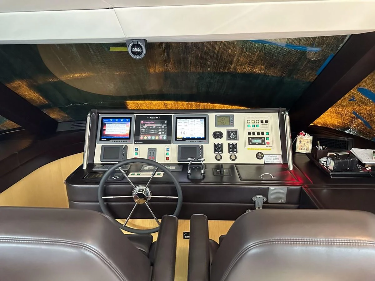 inside of a car aboard CHARISMA II Yacht for Sale