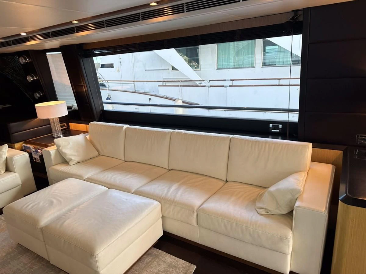 a couch in a room aboard CHARISMA II Yacht for Sale