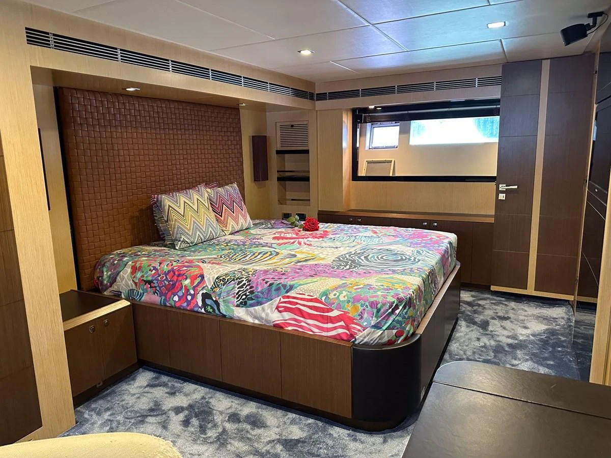 a bed in a room aboard CHARISMA II Yacht for Sale