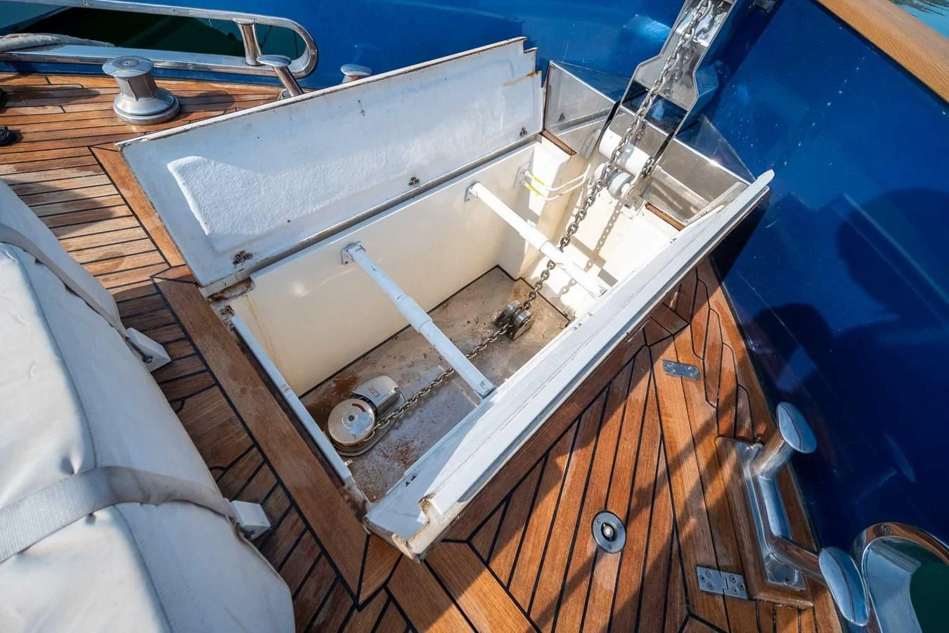 a white car with a metal door aboard CHARISMA II Yacht for Sale