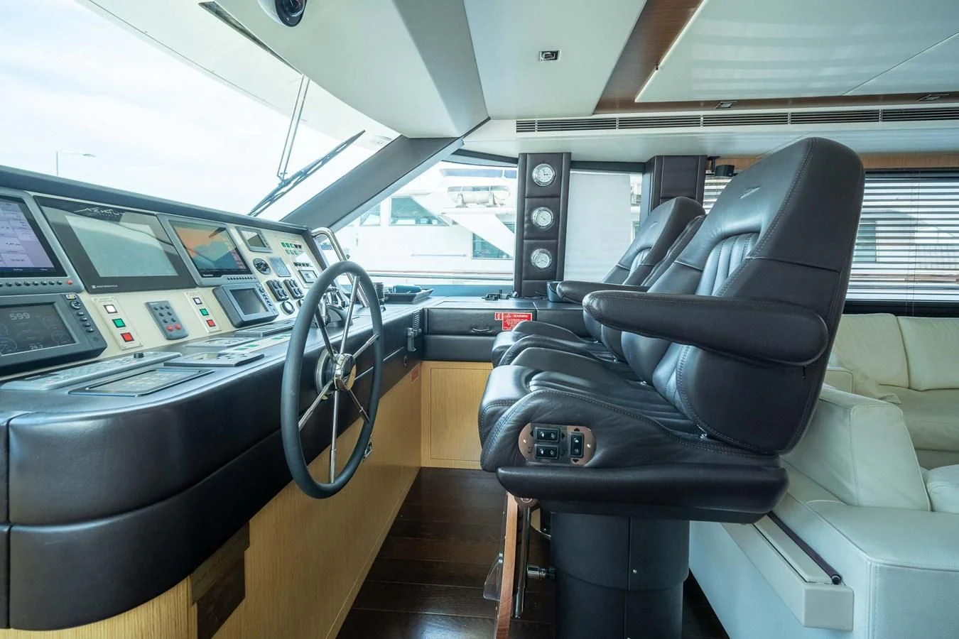 inside of a car aboard CHARISMA II Yacht for Sale