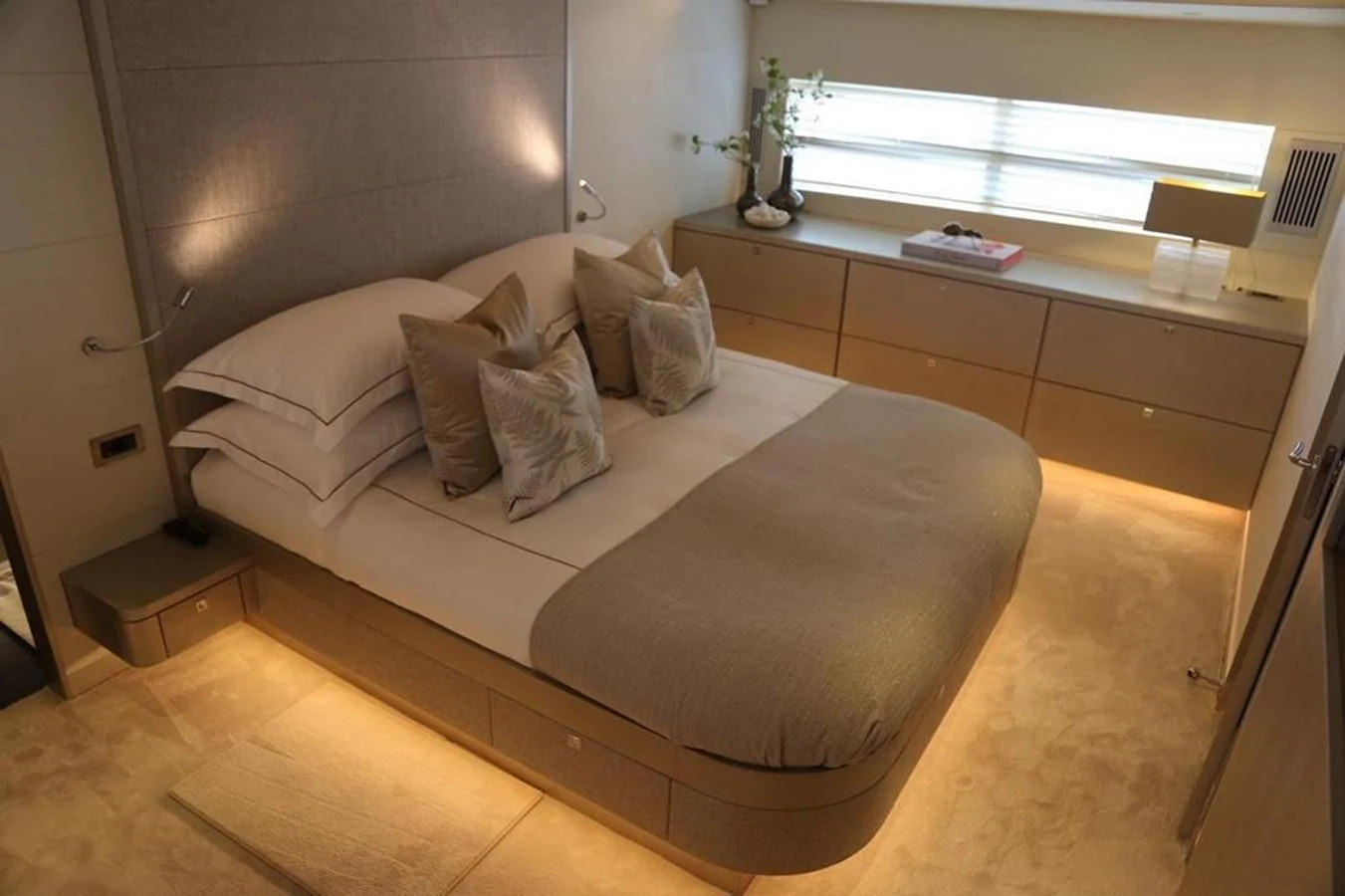 a bed in a room aboard ALILEA Yacht for Sale