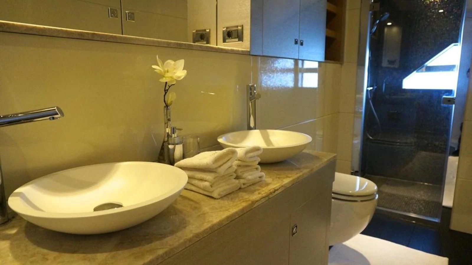 a bathroom with a sink and toilet aboard ALILEA Yacht for Sale