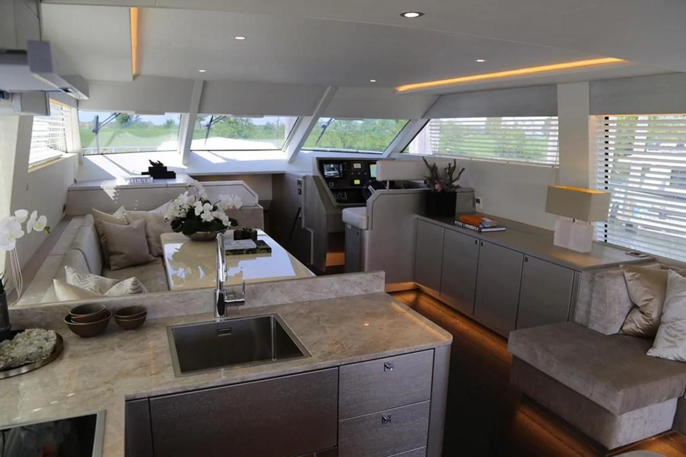 a kitchen with a large island aboard ALILEA Yacht for Sale
