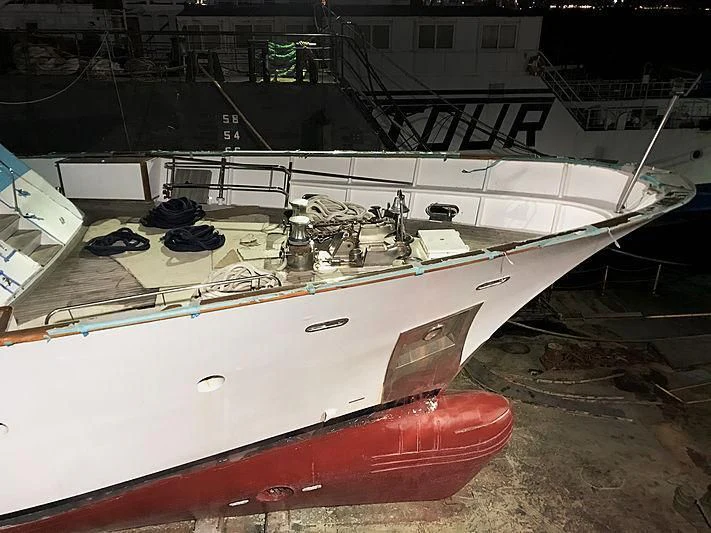 a boat on the water aboard COMMITMENT Yacht for Sale
