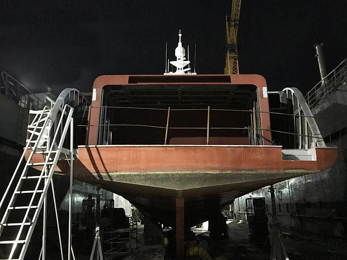 a large ship with a tower aboard COMMITMENT Yacht for Sale