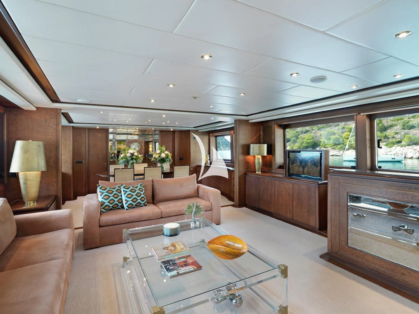 a living room with a large window aboard IDYLLE Yacht for Sale