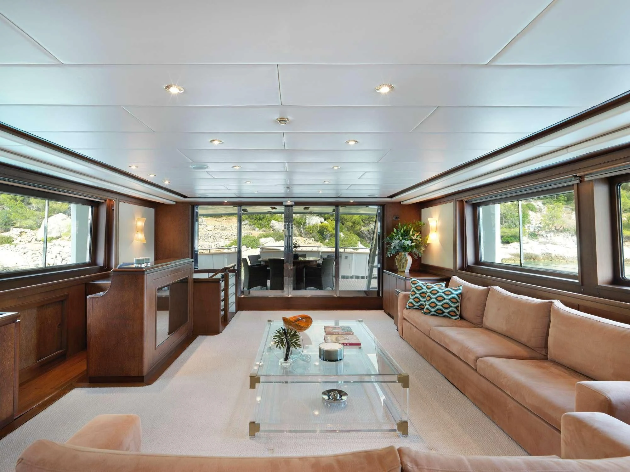 a living room with a large open window aboard IDYLLE Yacht for Sale