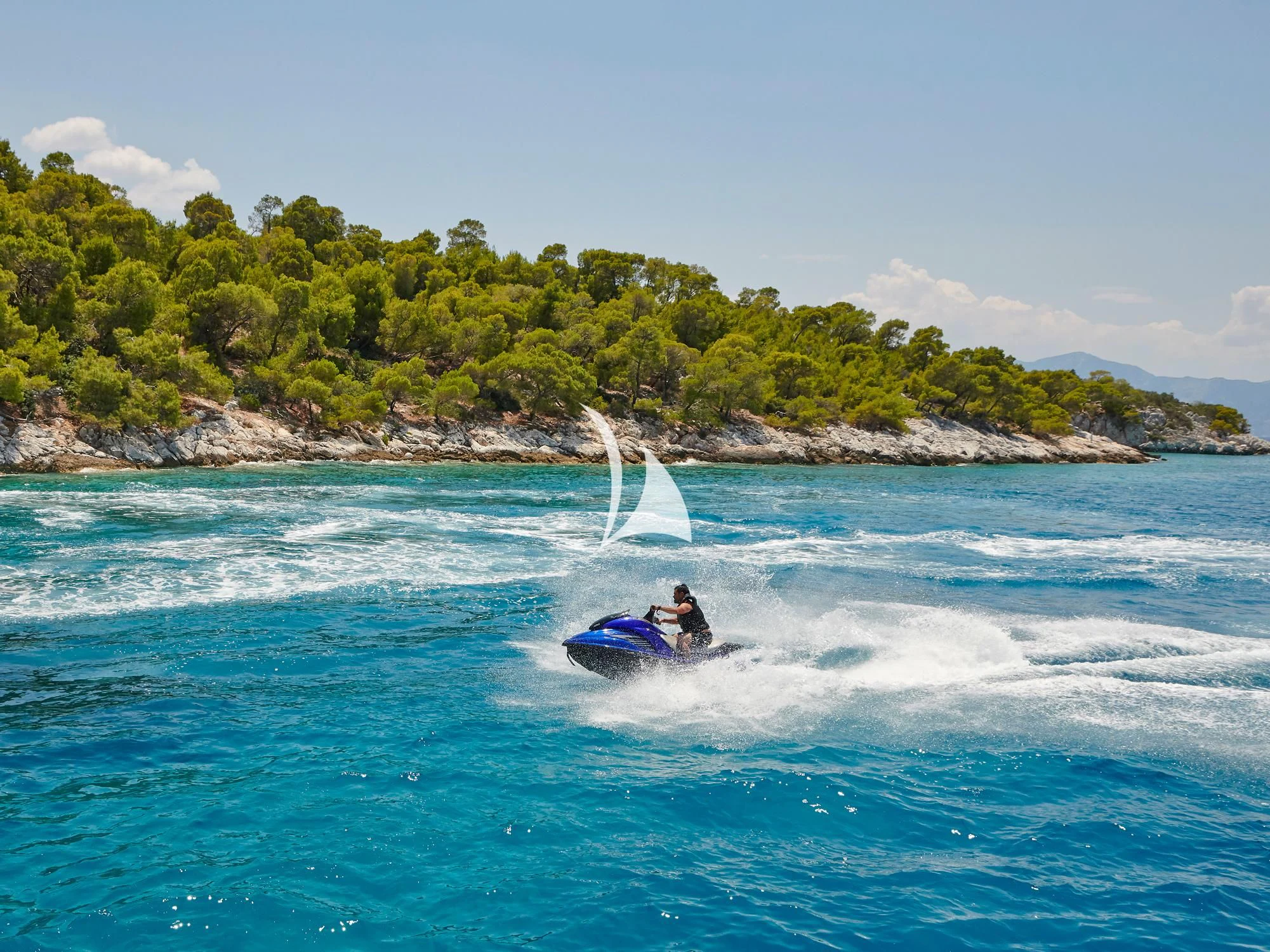 a person on a jet ski aboard IDYLLE Yacht for Sale