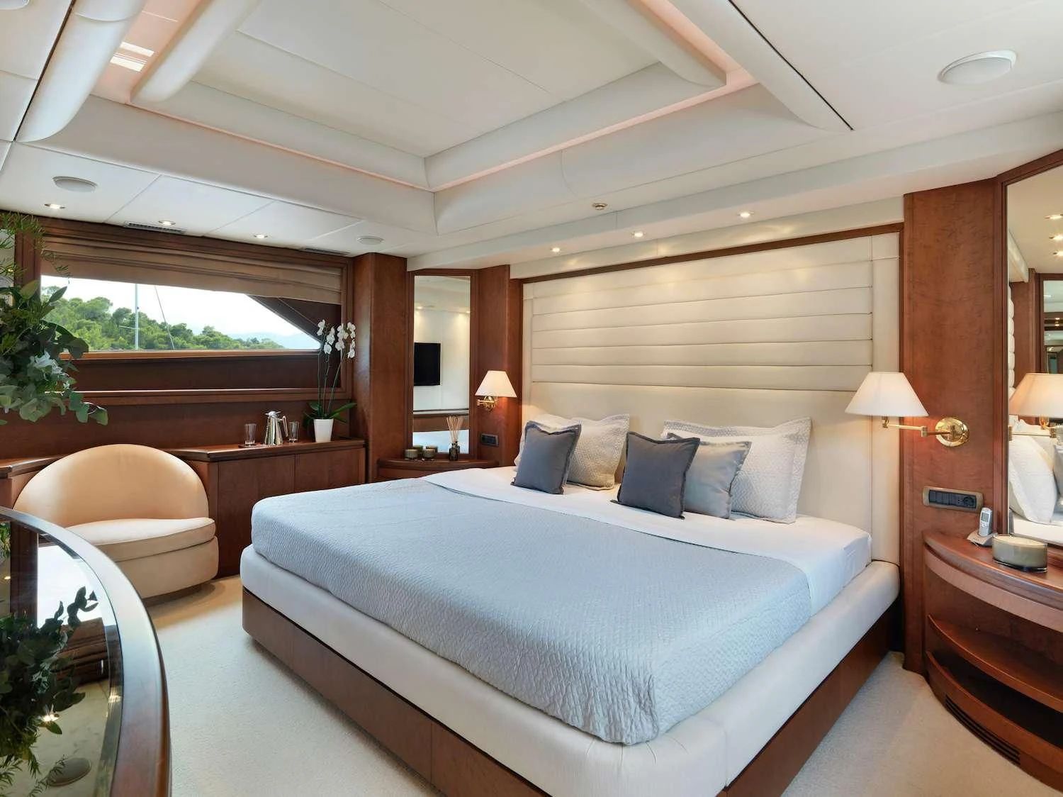 a large bed in a hotel room aboard IDYLLE Yacht for Sale