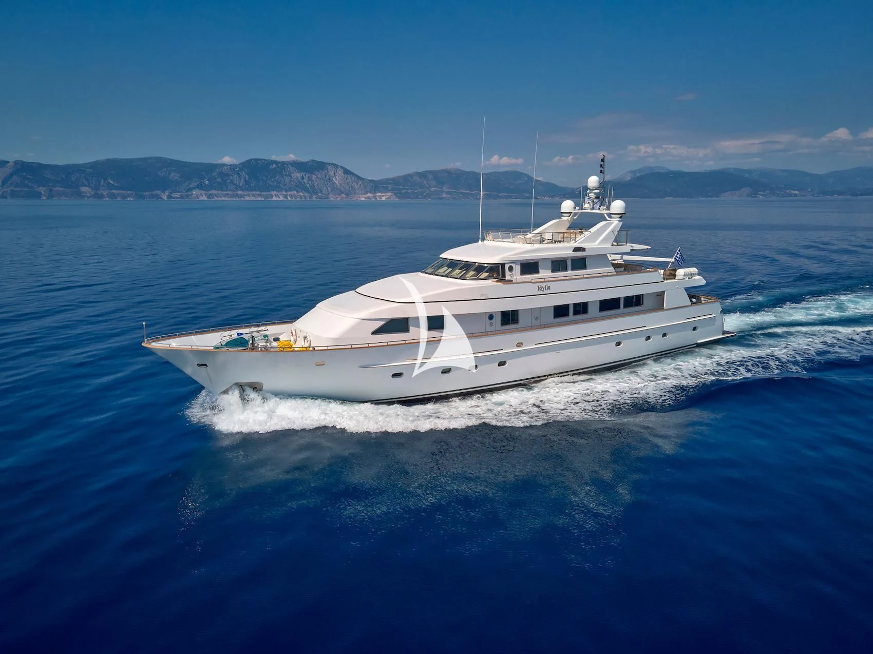 a white yacht in the water aboard IDYLLE Yacht for Sale