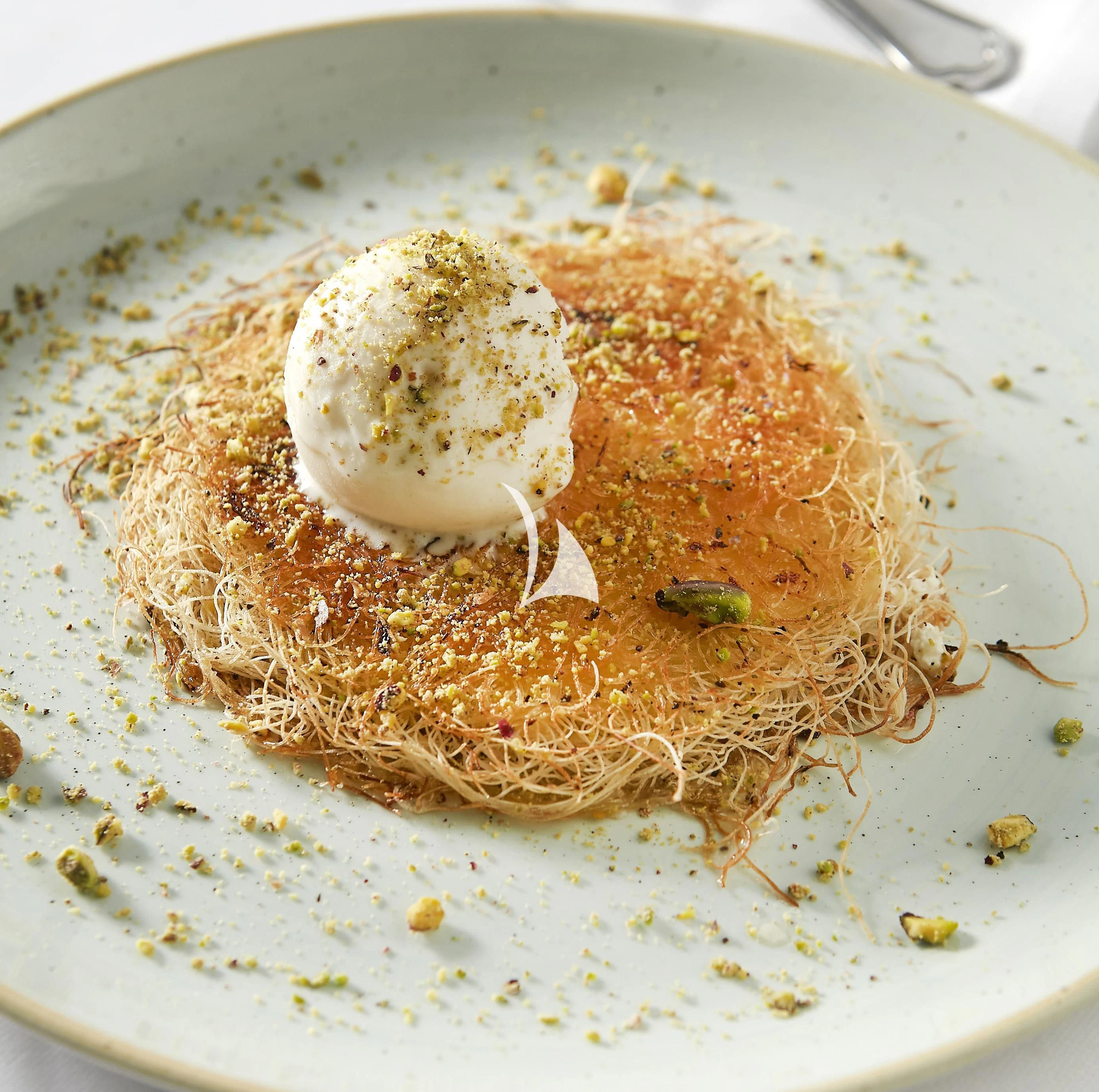 a plate of food aboard IDYLLE Yacht for Sale