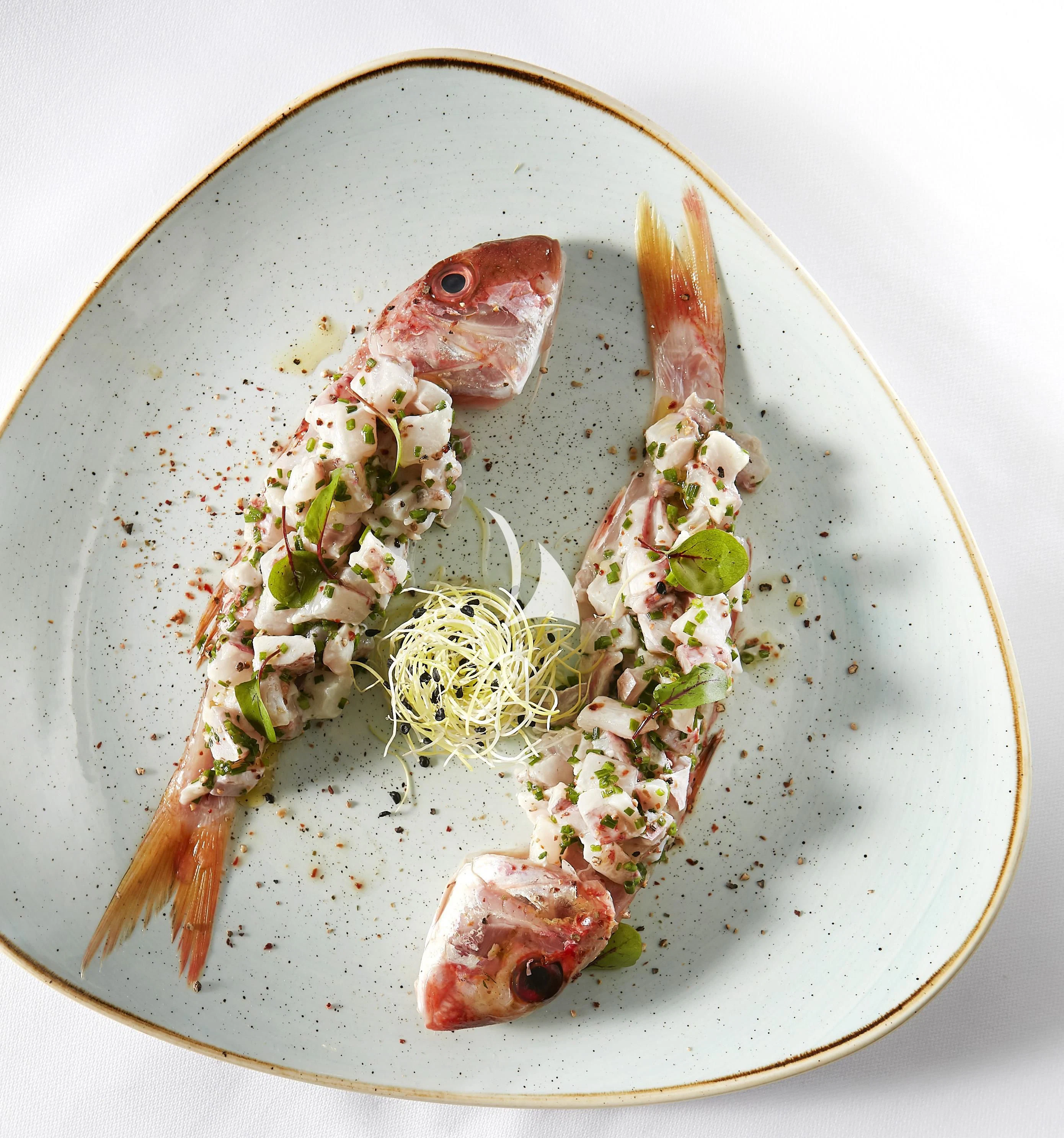 a plate of food aboard IDYLLE Yacht for Sale