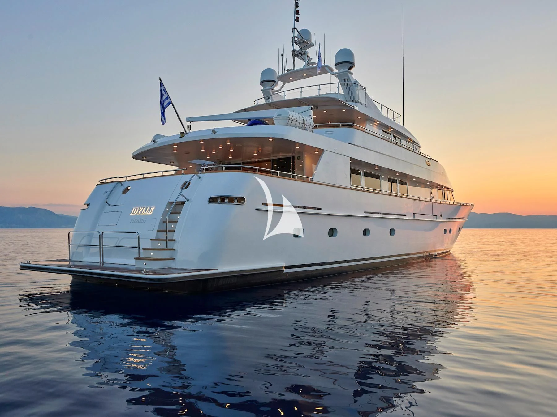 a large white boat on the water aboard IDYLLE Yacht for Sale
