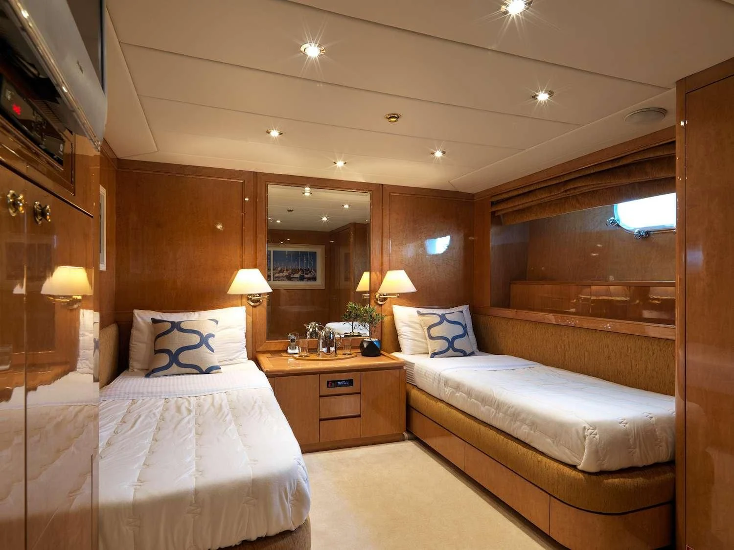 a hotel room with two beds aboard IDYLLE Yacht for Sale