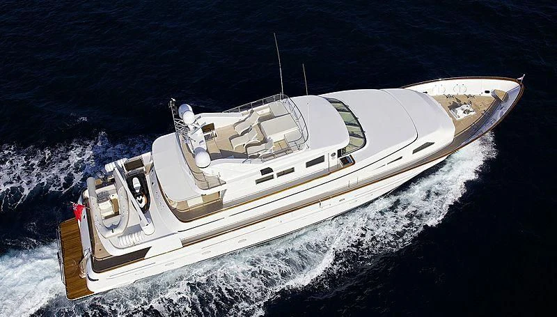 a white boat on a rough sea aboard IDYLLE Yacht for Sale