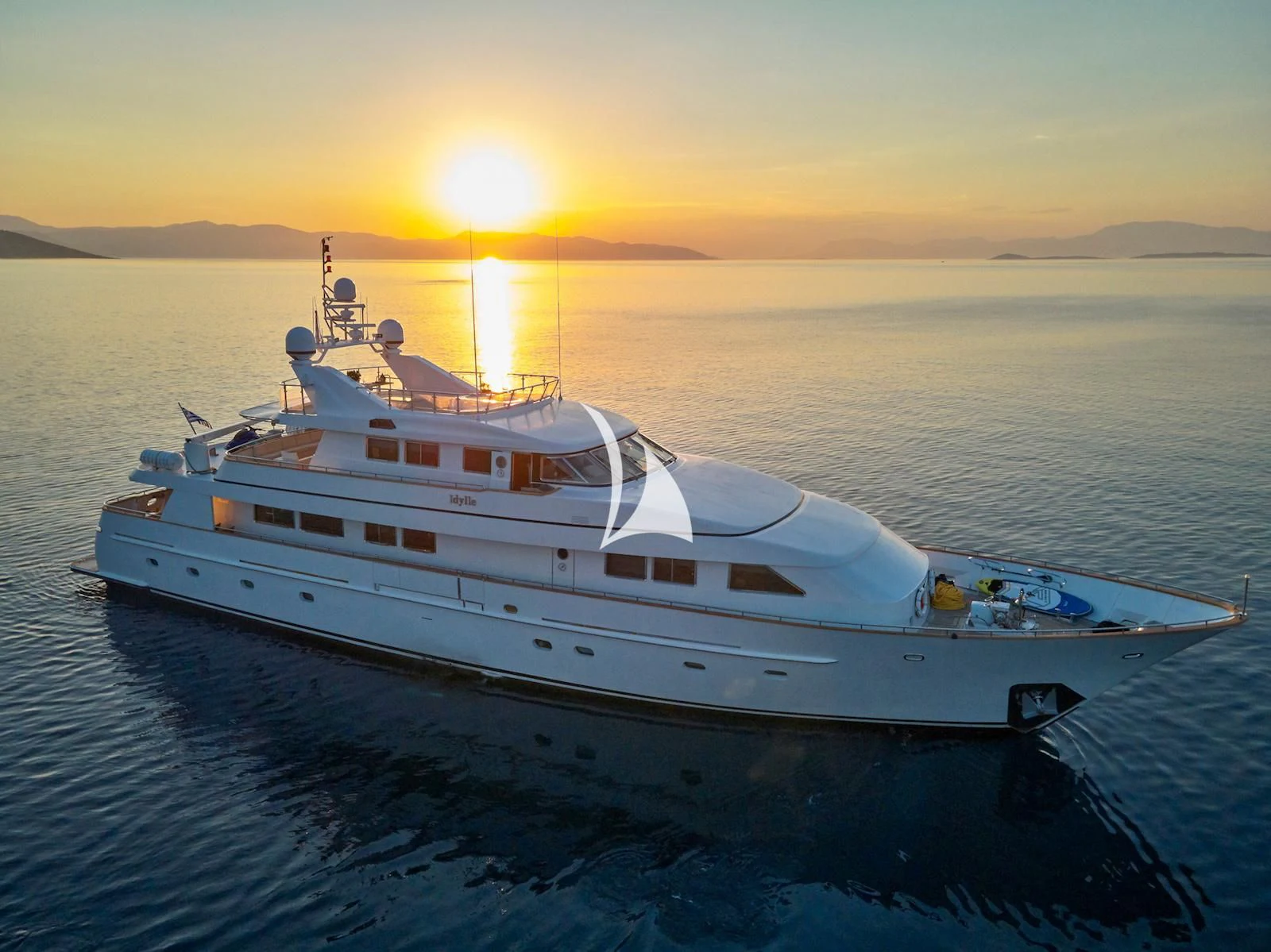 a white yacht in the water aboard IDYLLE Yacht for Sale