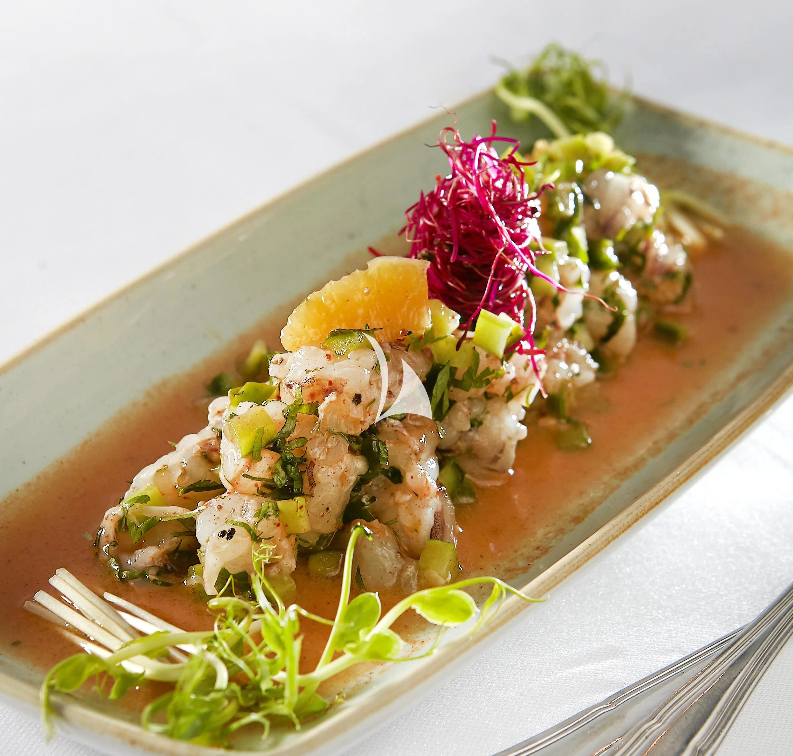 a plate of food aboard IDYLLE Yacht for Sale