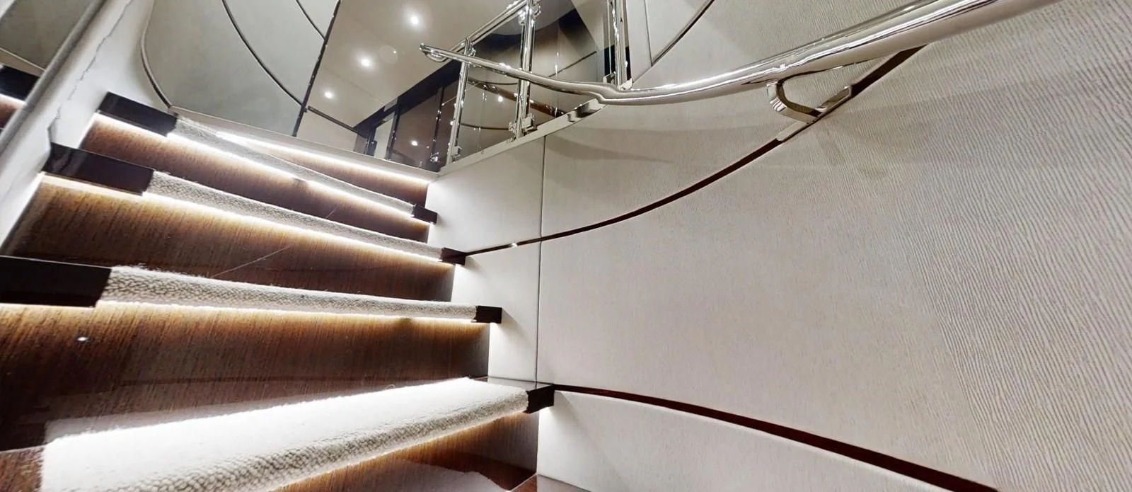 a close-up of a staircase aboard NOAH Yacht for Charter