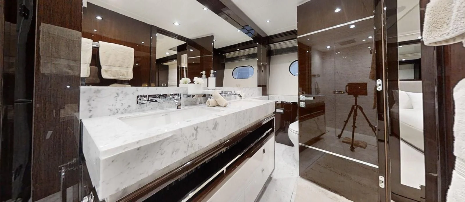 a bathroom with a sink and a mirror aboard NOAH Yacht for Charter