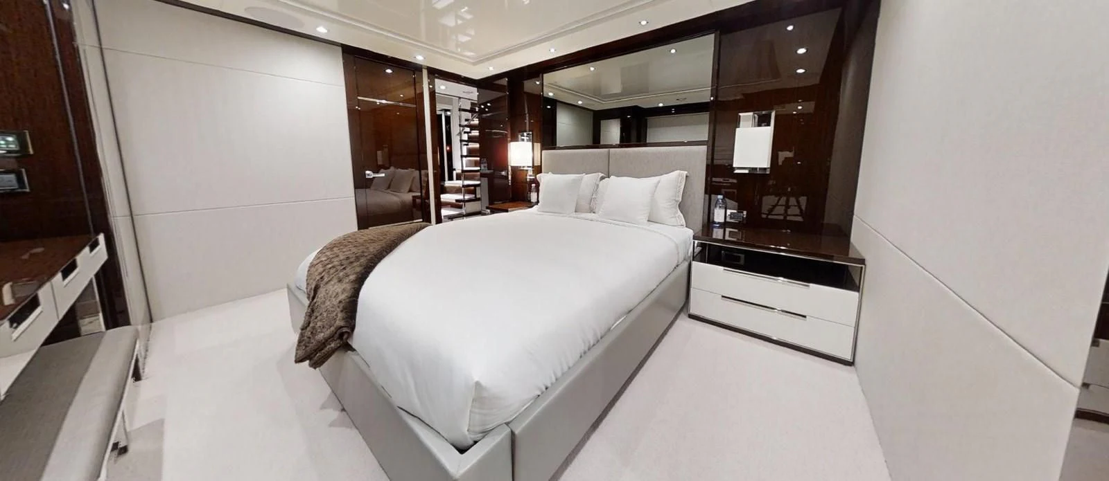 a room with two beds aboard NOAH Yacht for Charter