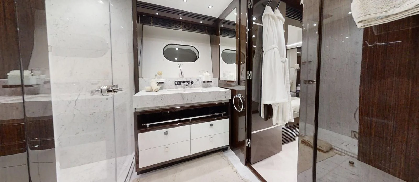 a bathroom with a shower unit and sink aboard NOAH Yacht for Charter