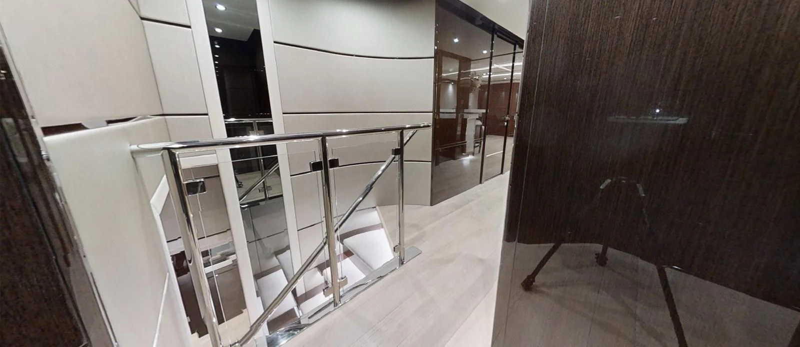 a staircase in a building aboard NOAH Yacht for Charter