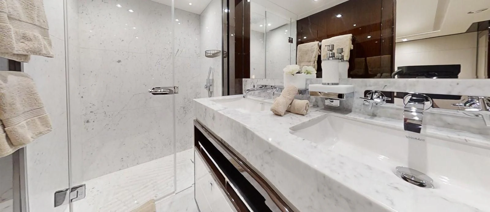 a bathroom with a large countertop aboard NOAH Yacht for Charter