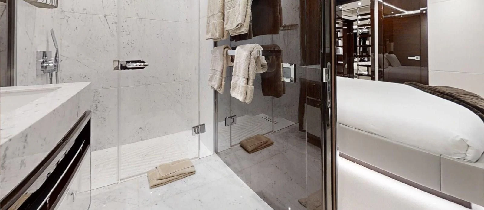 a bathroom with a tub sink and a mirror aboard NOAH Yacht for Charter