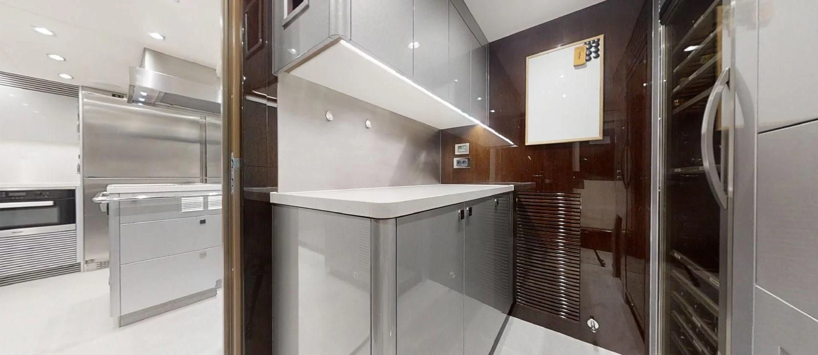 a kitchen with stainless steel appliances aboard NOAH Yacht for Charter