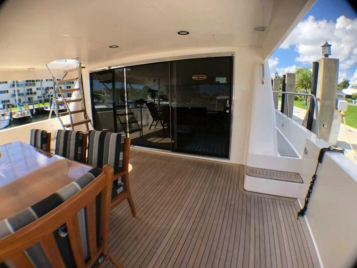 a balcony with a view of a city aboard ESCAPE Yacht for Sale