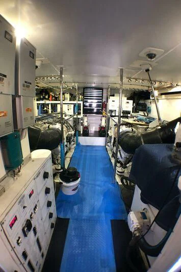 a room with a machine and equipment aboard ESCAPE Yacht for Sale