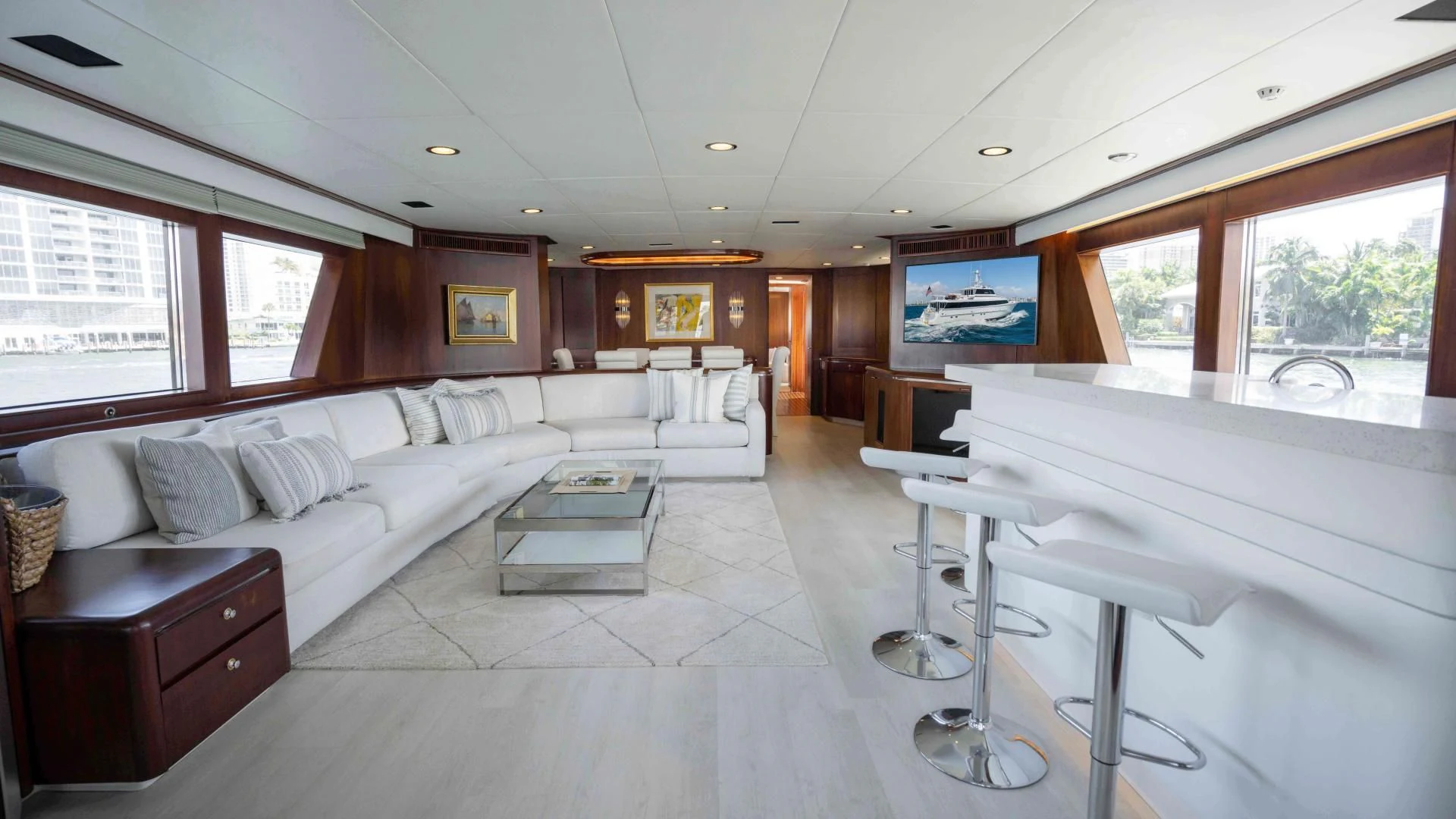 a living room with a couch and a table aboard ARIES Yacht for Sale