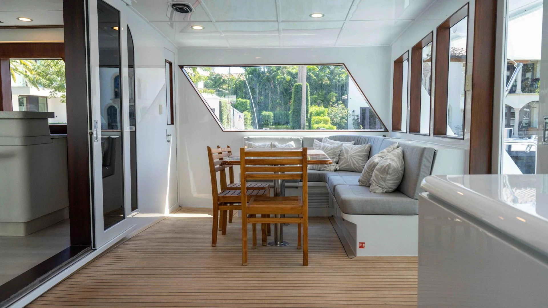 a living room with a couch and a table aboard ARIES Yacht for Sale