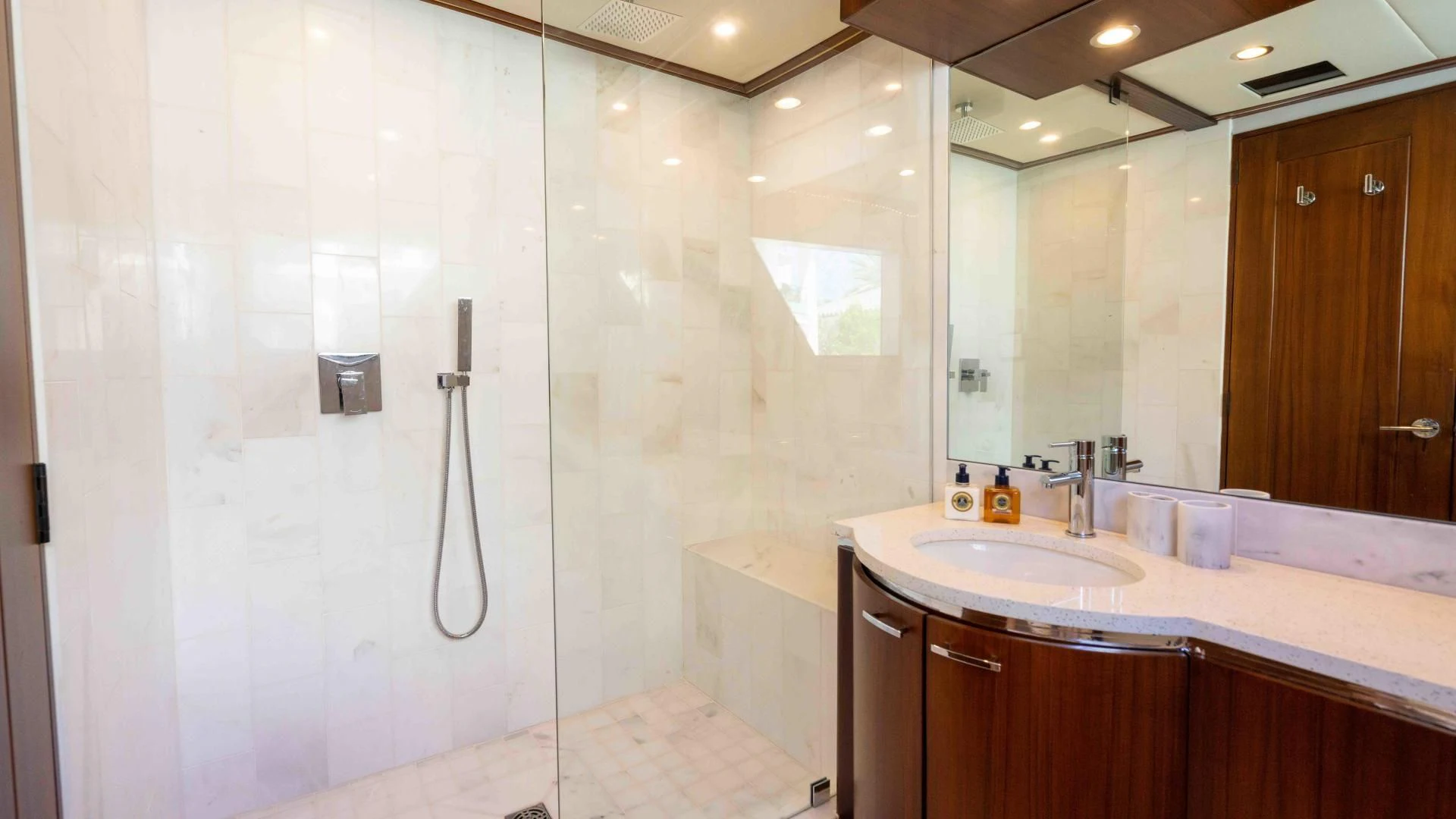 a bathroom with a shower and sink aboard ARIES Yacht for Sale