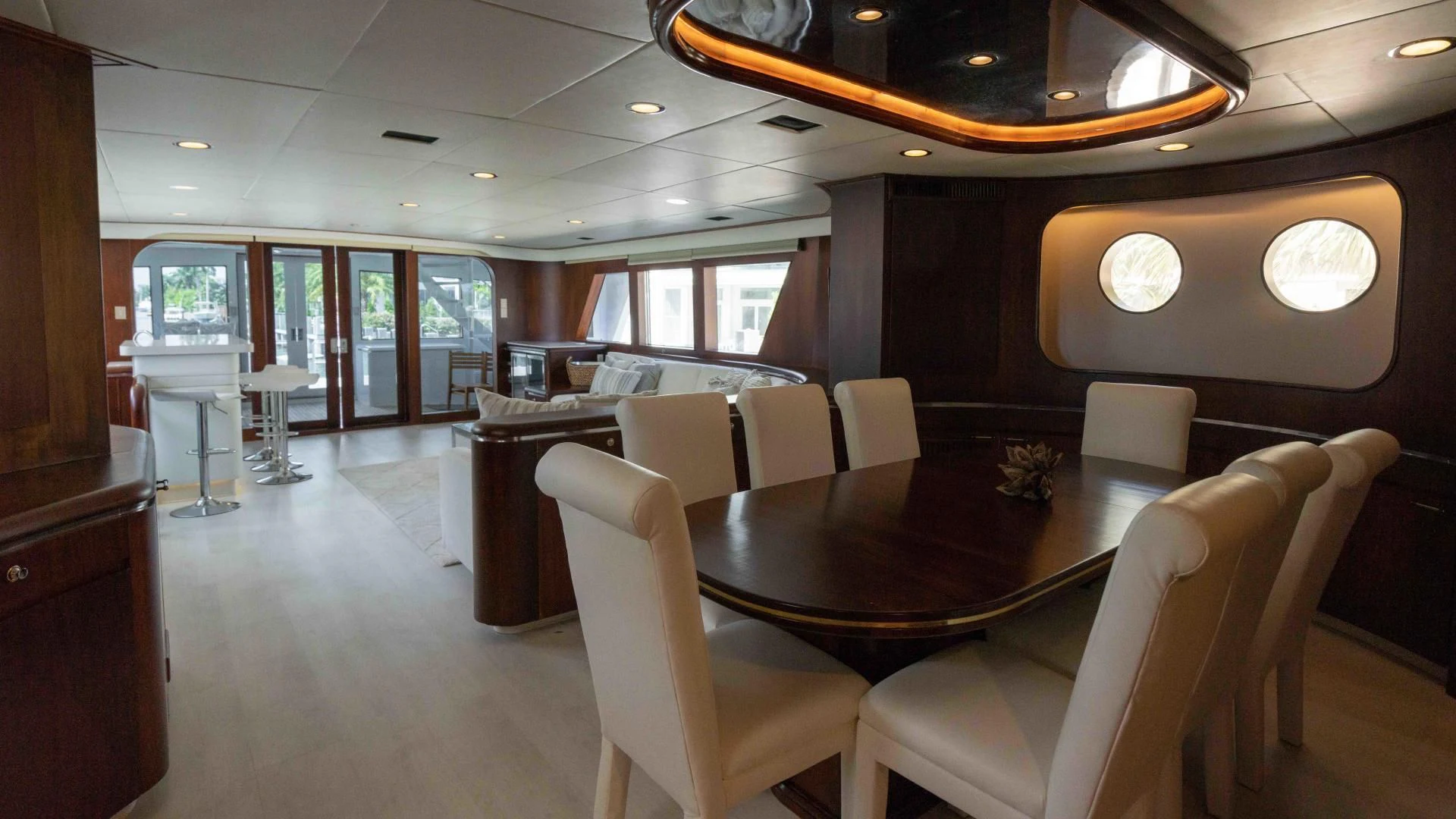 a room with a table and chairs aboard ARIES Yacht for Sale