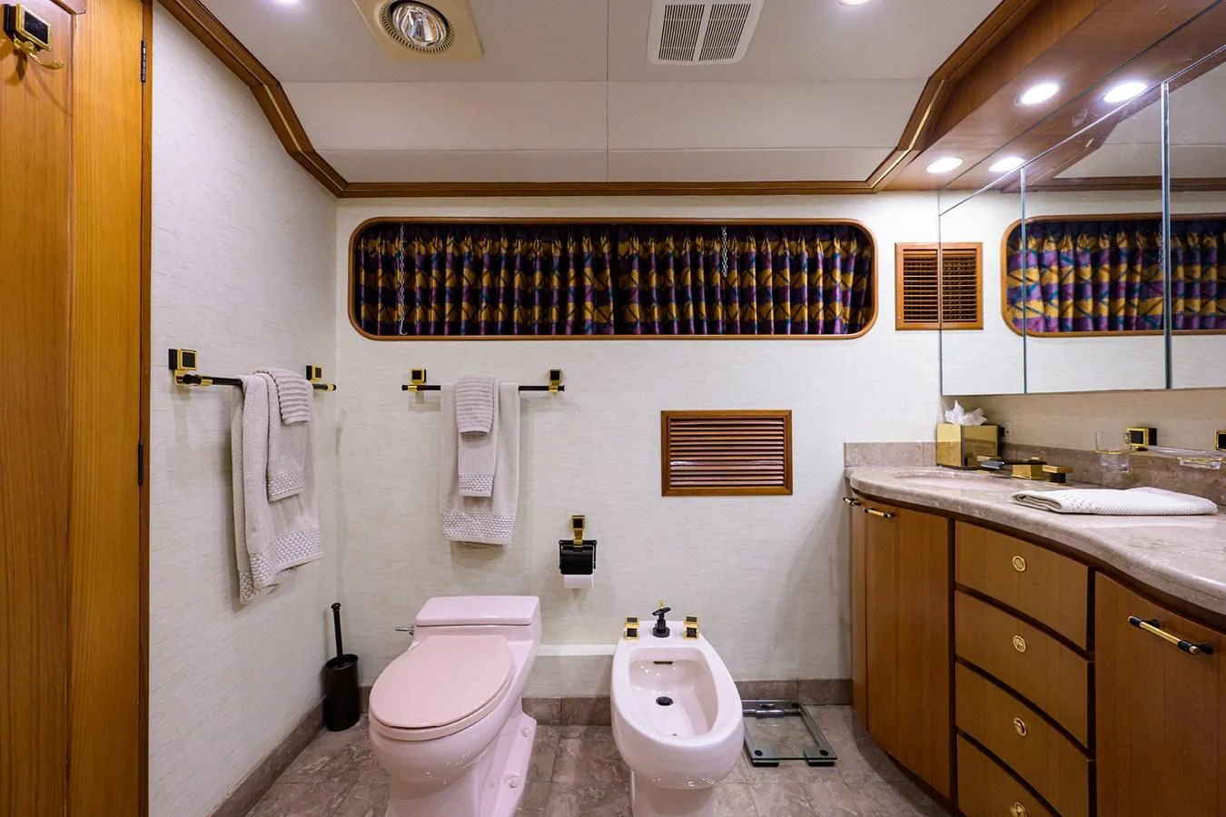 a bathroom with a toilet and sink aboard ARIES Yacht for Sale