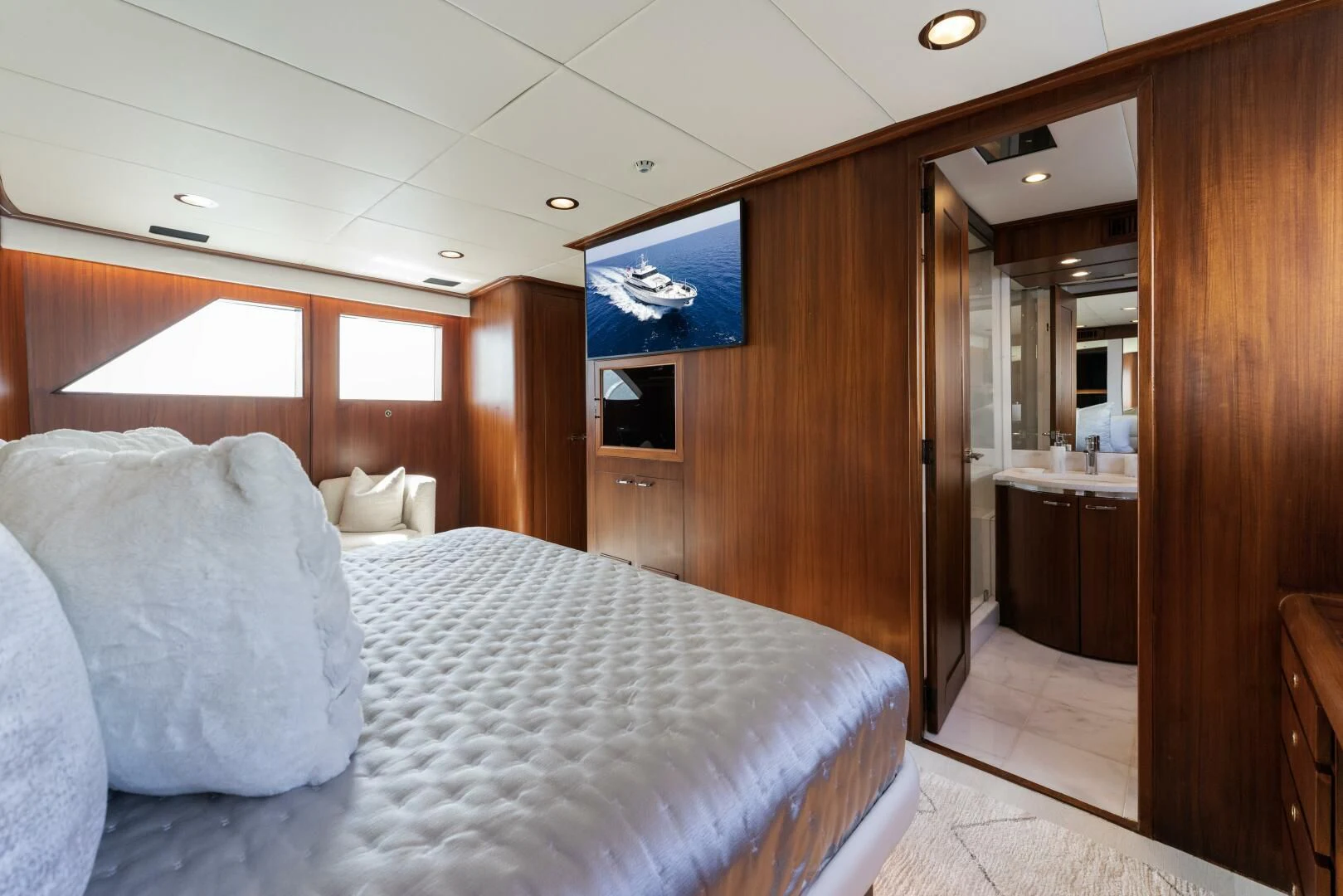 a bed in a room aboard ARIES Yacht for Sale