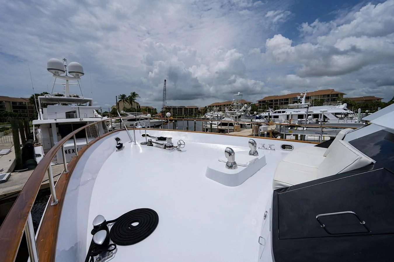 a large white boat with a white sail on it aboard ARIES Yacht for Sale